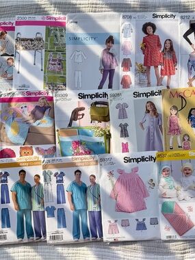 Simplicity Sewing Pattern Covers with Pink and White Accents